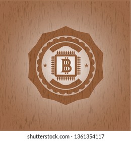 bitcoin chip (cryptocurrency mining concept) icon inside badge with wood background