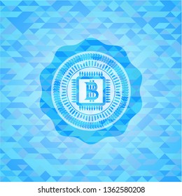 bitcoin chip (cryptocurrency mining concept) icon inside sky blue emblem with triangle mosaic background