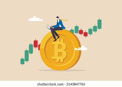 Bitcoin and cryptocurrency investing, crypto trading make profit and earning from Bitcoin price, businessman investor using computer to trade crypto on big Bitcoin with candlestick price graph chart.