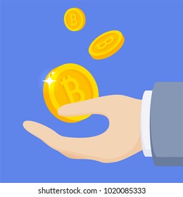 Bitcoin falling to the businessman hand concept in flat style design. Attract cryptocurreny.