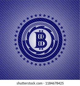 bitcoin icon inside badge with denim background