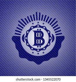 bitcoin icon inside badge with jean texture