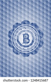 bitcoin icon inside blue badge with geometric pattern background.
