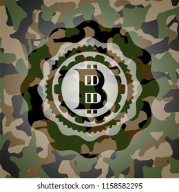 bitcoin icon inside camo texture