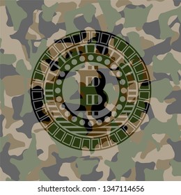 bitcoin icon inside camo texture