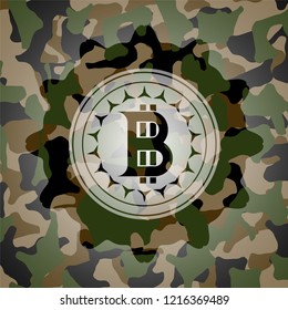 bitcoin icon inside camouflage emblem