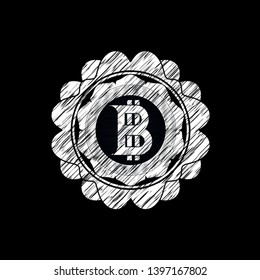 bitcoin icon inside chalk emblem written on a blackboard