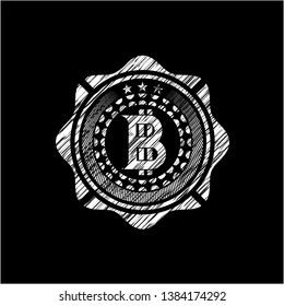 bitcoin icon inside chalkboard emblem on black board