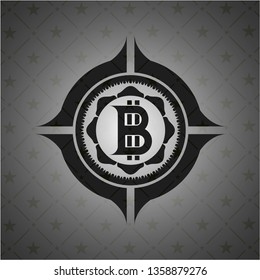 bitcoin icon inside dark badge or emblem