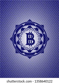 bitcoin icon inside jean or denim emblem or badge background