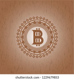 bitcoin icon inside retro wood emblem