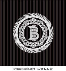 bitcoin icon inside silvery emblem