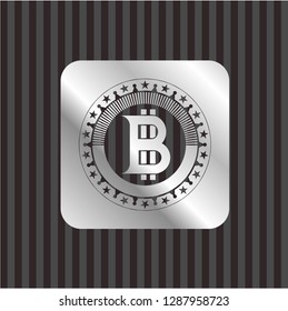 bitcoin icon inside silvery emblem
