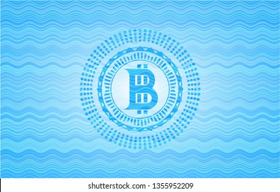 bitcoin icon inside sky blue water wave emblem.