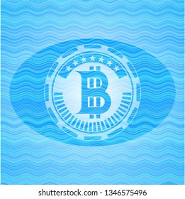 bitcoin icon inside water concept badge.