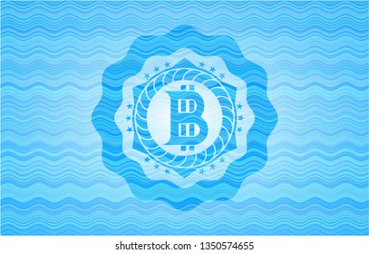 bitcoin icon inside water emblem.