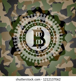 bitcoin icon on camo pattern