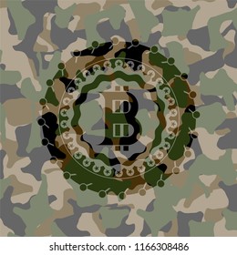 bitcoin icon on camouflaged texture