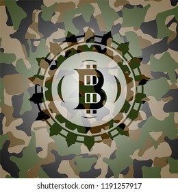 bitcoin icon on camouflaged texture