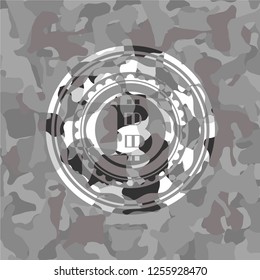 bitcoin icon on grey camouflage pattern