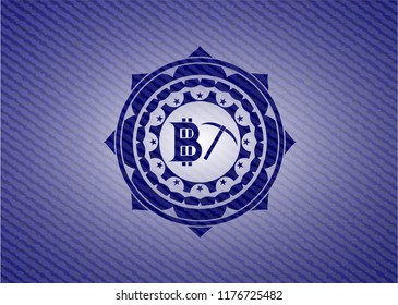 bitcoin mining icon inside badge with denim texture