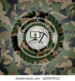 bitcoin mining icon inside camouflage emblem