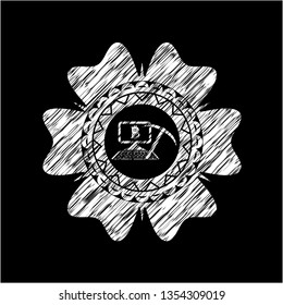 bitcoin mining icon inside chalk emblem written on a blackboard