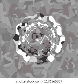 bitcoin mining icon inside grey camouflage texture