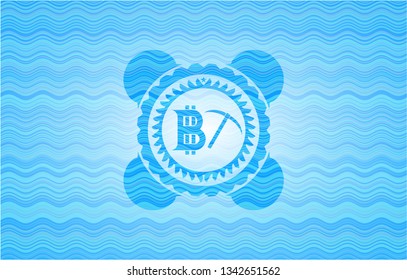 bitcoin mining icon inside light blue water style badge.