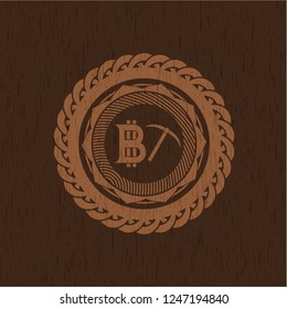 bitcoin mining icon inside vintage wooden emblem