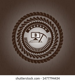 bitcoin mining icon inside wooden emblem