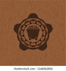 Bitcoin mining trolley icon inside wooden emblem. Retro