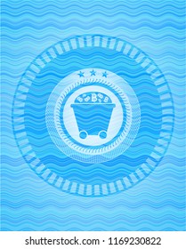 Bitcoin mining trolley icon inside water concept emblem background.