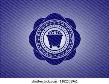 Bitcoin mining trolley icon inside emblem with jean high quality background