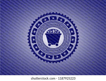 Bitcoin mining trolley icon inside emblem with denim texture