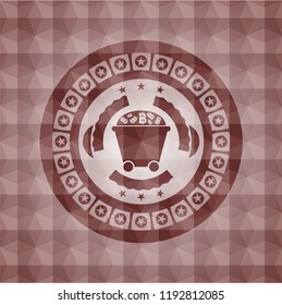 Bitcoin mining trolley icon inside red seamless emblem with geometric background.