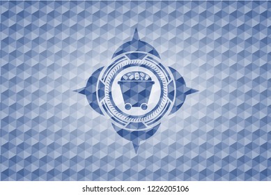 Bitcoin mining trolley icon inside blue emblem with geometric pattern background.