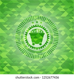 Bitcoin mining trolley icon inside realistic green emblem. Mosaic background