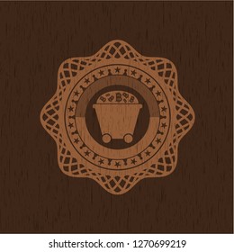 Bitcoin mining trolley icon inside wooden emblem