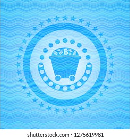 Bitcoin mining trolley icon inside water wave representation emblem background.