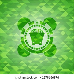 Bitcoin mining trolley icon inside realistic green mosaic emblem