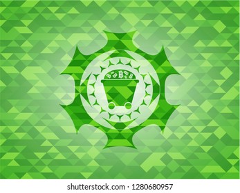 Bitcoin mining trolley icon inside green emblem with mosaic background