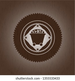Bitcoin mining trolley icon inside vintage wooden emblem