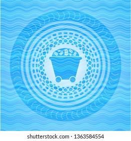 Bitcoin mining trolley icon inside water emblem.