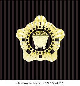 Bitcoin mining trolley icon inside golden badge or emblem
