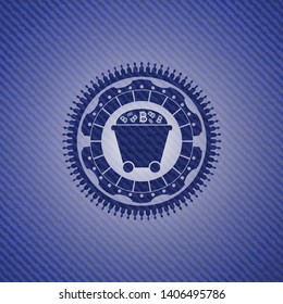 Bitcoin mining trolley icon inside jean or denim emblem or badge background
