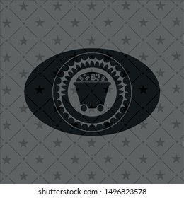 Bitcoin mining trolley icon inside dark emblem