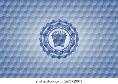 Bitcoin mining trolley icon inside blue emblem with geometric pattern background.