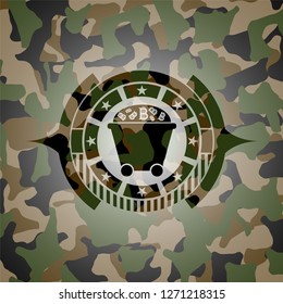 Bitcoin mining trolley icon on camo pattern