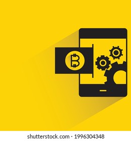bitcoin payment on mobile phone icon on yellow background